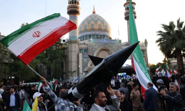 Iran Threatens Devastating Response if Israel Retaliates Against Missile Strikes